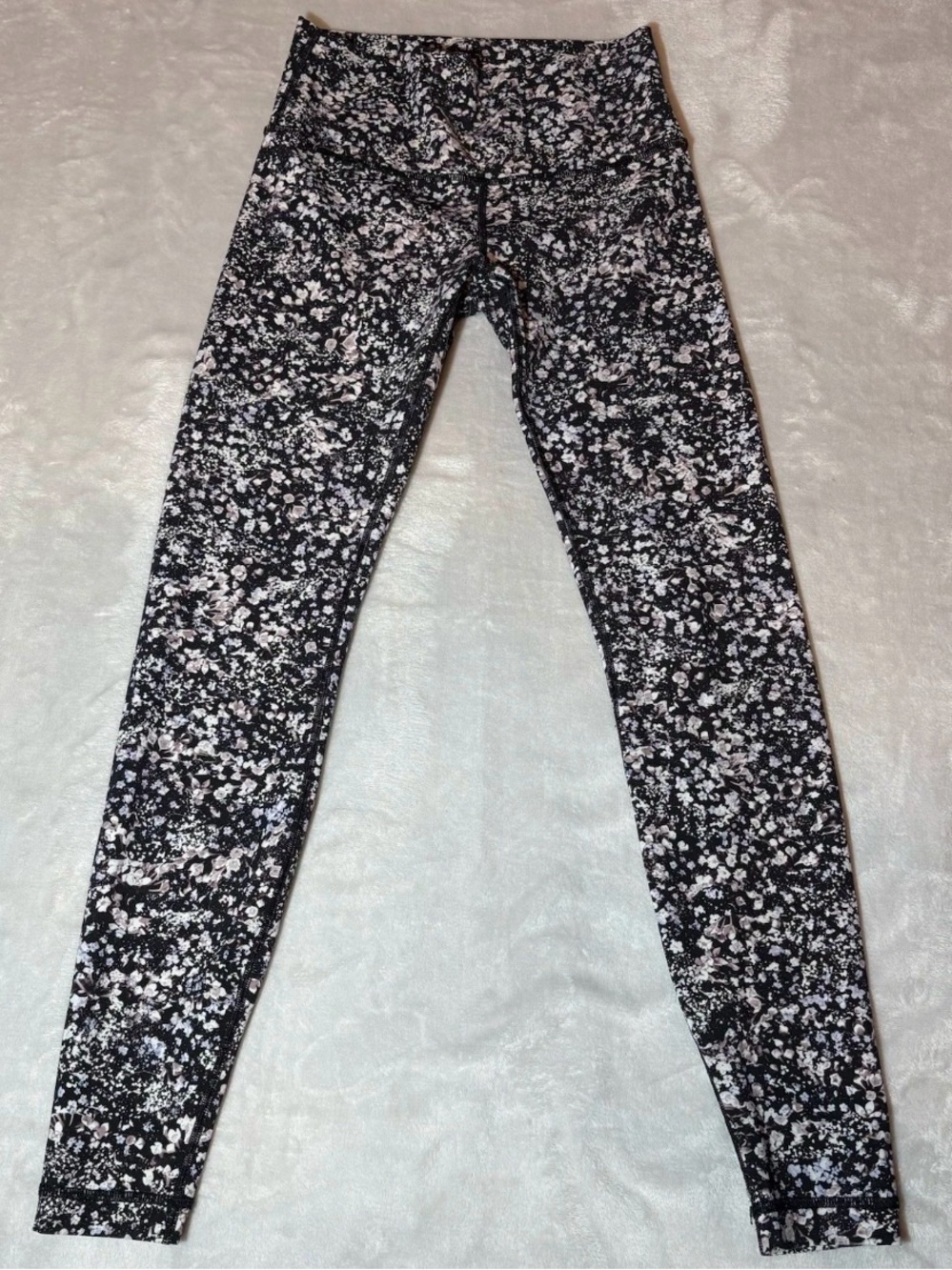Lululemon high-rise black floral pattern, tight leggings, great support, size 6